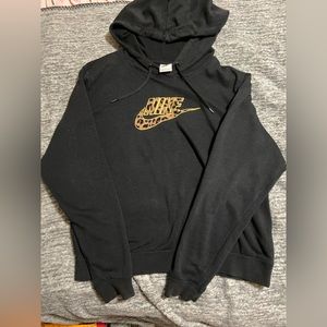 NWOT Black Nike Hoodie with Leopard print Nike symbol rare